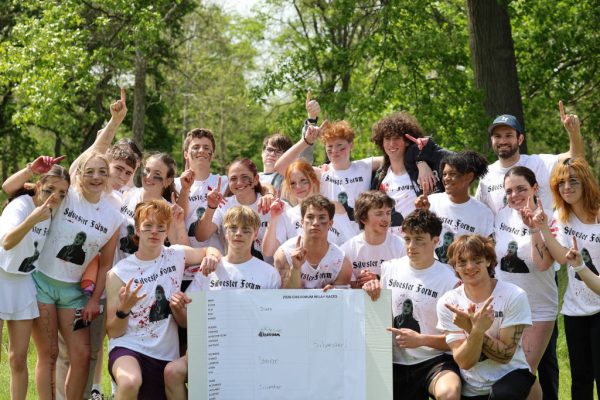 The Silvester forum poses with their winning relay race bracket. Working together as a team in the final round of tug-of-war, they also claimed victory over the Kiley forum. "I was so excited for the kids," forum leader Ryan Silvester said. "The Kiley forum knocked us out last year, so it was like a full circle moment."